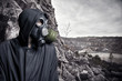 Portrait of a man in a gas mask and hood