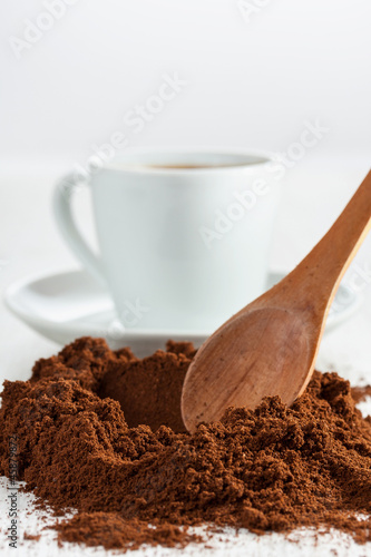 Photo: Freshly ground coffee and a cup Freshly ground coffee and a cup