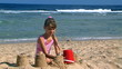 Child playing on  beach.