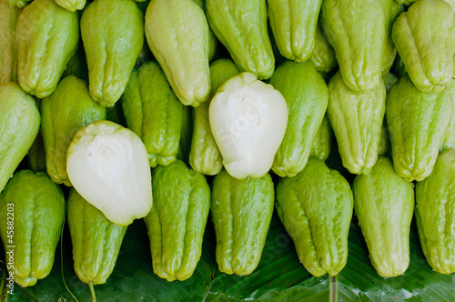 Photo: Fresh Chayote vegetables cut for detail Fresh Chayote vegetables cut for detail