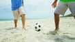 Vídeo: African American boys playing soccer ball on beach shot African American boys playing soccer ball on beach shot