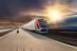 Foto: High-speed train passing station High-speed train passing station