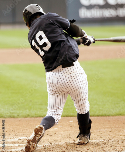 Photo: Baseball batter swinging Baseball batter swinging
