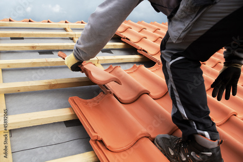 Photo: roofer at work roofer at work