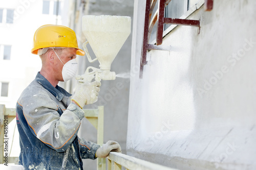 Photo: builder facade plasterer worker builder facade plasterer worker
