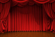 stage with open velvet curtain