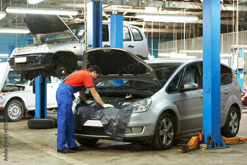 Photo: auto mechanic at work auto mechanic at work