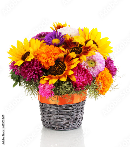 Photo: Beautiful bouquet of bright flowers isolated on white Beautiful bouquet of bright flowers isolated on white