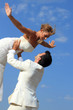 Photo: Young couple at their beach wedding Young couple at their beach wedding
