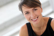Portrait of attractive businesswoman sitting in office