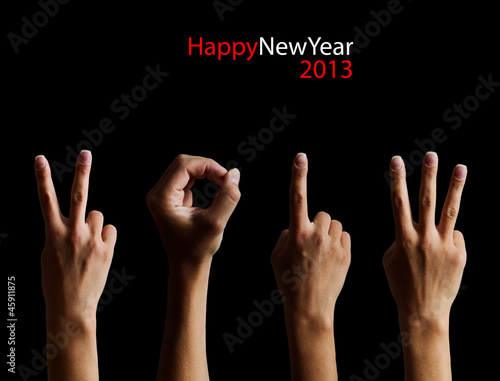 Photo: The number 2013 shown by fingers in creative New Year greeting c The number 2013 shown by fingers in creative New Year greeting c