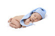 newborn baby curled up sleeping on a blanket