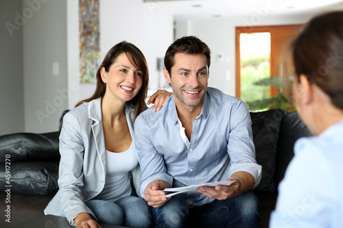 Photo: Couple meeting consultant for financial contract Couple meeting consultant for financial contract