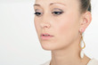 Foto: junge Frau mit Ohrschmuck junge Frau mit Ohrschmuck
