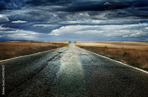 Photo: Old dramatic asphalt road Old dramatic asphalt road
