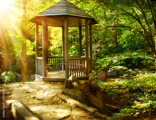 Photo: Arbor in Autumnal Park. Landscaping Arbor in Autumnal Park. Landscaping