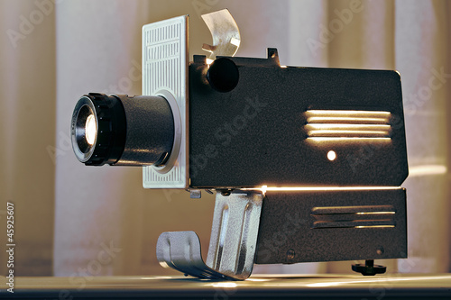 Photo: Working projector on table top radiating heat Working projector on table top radiating heat