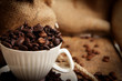 Coffee beans and cup