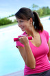 Woman With Pink Shirt Lifting ...