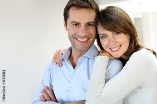 Photo: Portrait of married couple at home Portrait of married couple at home