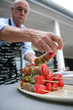 Man preparing a meal for a barbecue