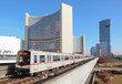 Photo: Train near building Train near building