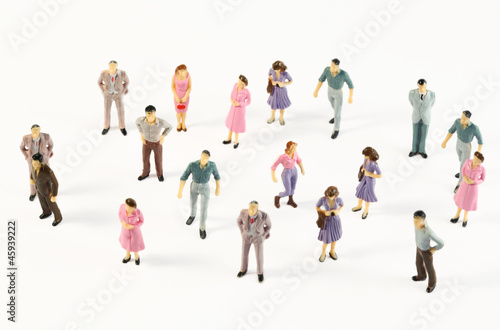 Photo: Toy, miniature figures of human in costumes, view from above Toy, miniature figures of human in costumes, view from above