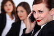 Three businesswomen stood together