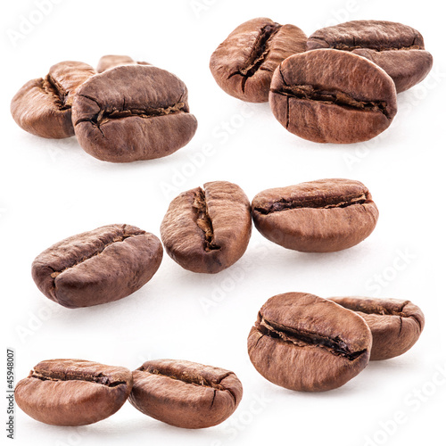 Photo: Coffee beans on white background, closeup Coffee beans on white background, closeup