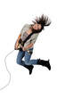 Young woman playing the electric guitar