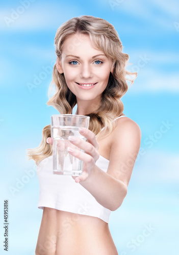 Photo: beautiful woman with glass of water beautiful woman with glass of water