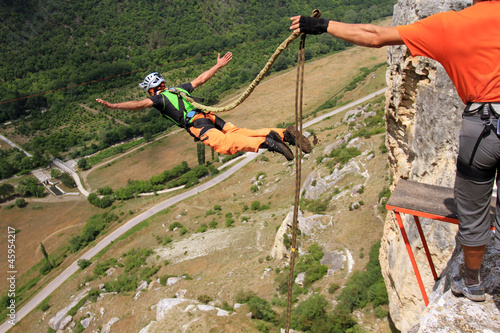 Photo: Jump off a cliff with a rope. Jump off a cliff with a rope.