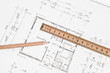 Bauplan für Haus mit Bleistift und Zollstock