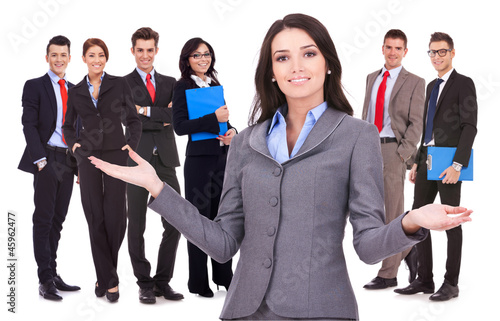Photo: business woman welcoming to her team business woman welcoming to her team
