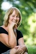 Smiling mature woman outdoor portrait