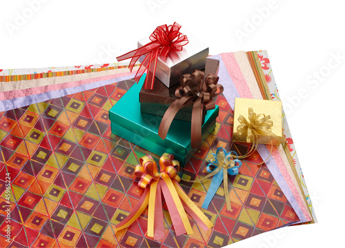 Photo: Colorful gift box with wrapping papers Colorful gift box with wrapping papers