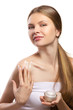 girl appying  cream for body