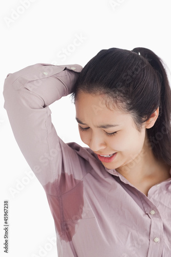 Photo: Woman looking at sweat patches Woman looking at sweat patches