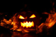 Halloween pumpkin in fire