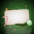 Christmas card with ornaments with green background