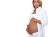 Pregnant woman in white