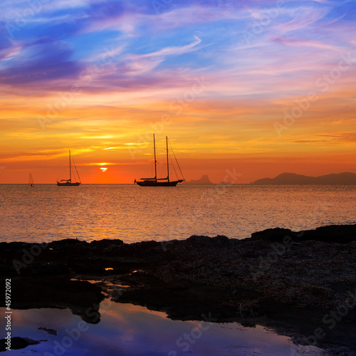 Photo: colorful sunset of Ibiza view from formentera colorful sunset of Ibiza view from formentera