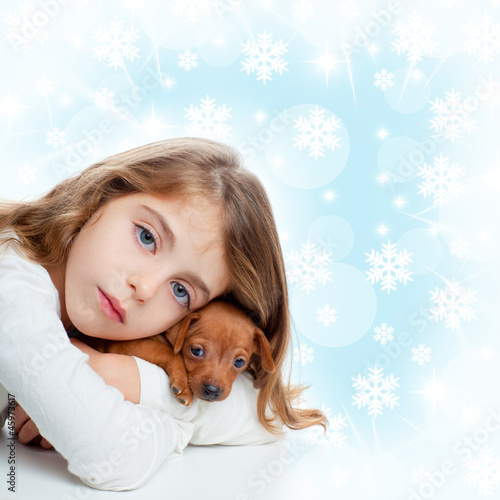 Photo: christmas children girl hug a puppy brown dog christmas children girl hug a puppy brown dog