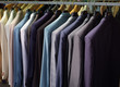 Photo: colorful male suits in row in a hanger colorful male suits in row in a hanger