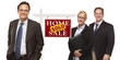 Men and Woman with Sold Real Estate Sign Isolated
