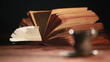 Video: old book and a cup on the table old book and a cup on the table