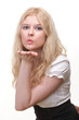 beautiful young woman blowing a kiss
