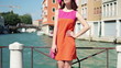 Video: Rich woman in hat standing on the bridge in Venice Rich woman in hat standing on the bridge in Venice