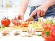 Hands  cooking vegetables salad