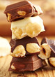 Milk, dark and white chocolate with nuts